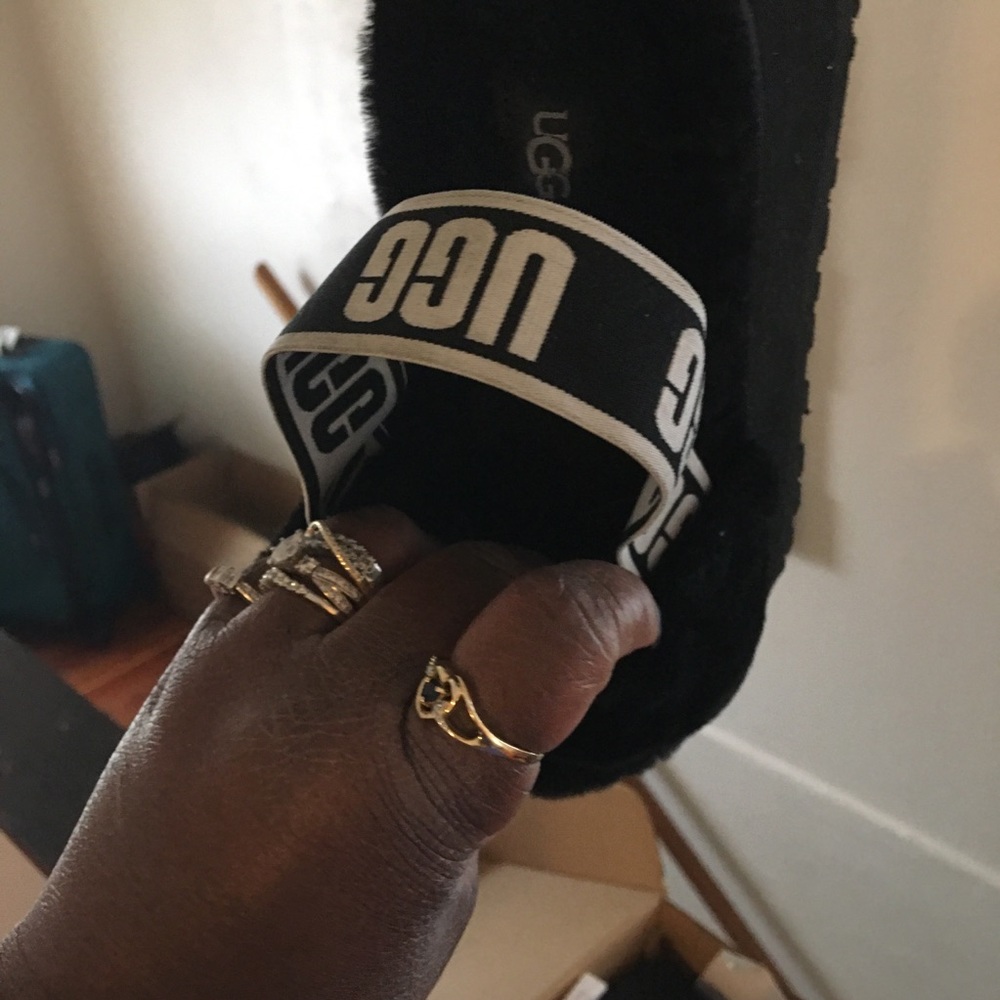Closet Cleaning Black furry Uggs. Worn once or twice Great condition.